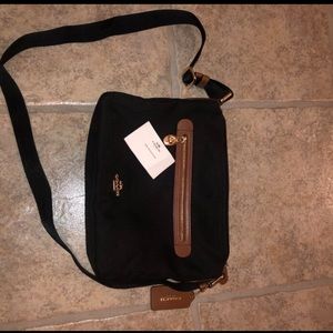 Black canvass cross body coach purse
